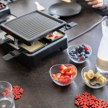 Unold Επιτραπέζια Ηλεκτρική Ψησταριά Raclette Λείας και Αυλακωτής Πλάκας 1300W 21x21εκ.