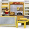 Bruder Παιχνίδι Μινιατούρα Κατάστημα DHL με Υπάλληλο για 4+ Ετών
